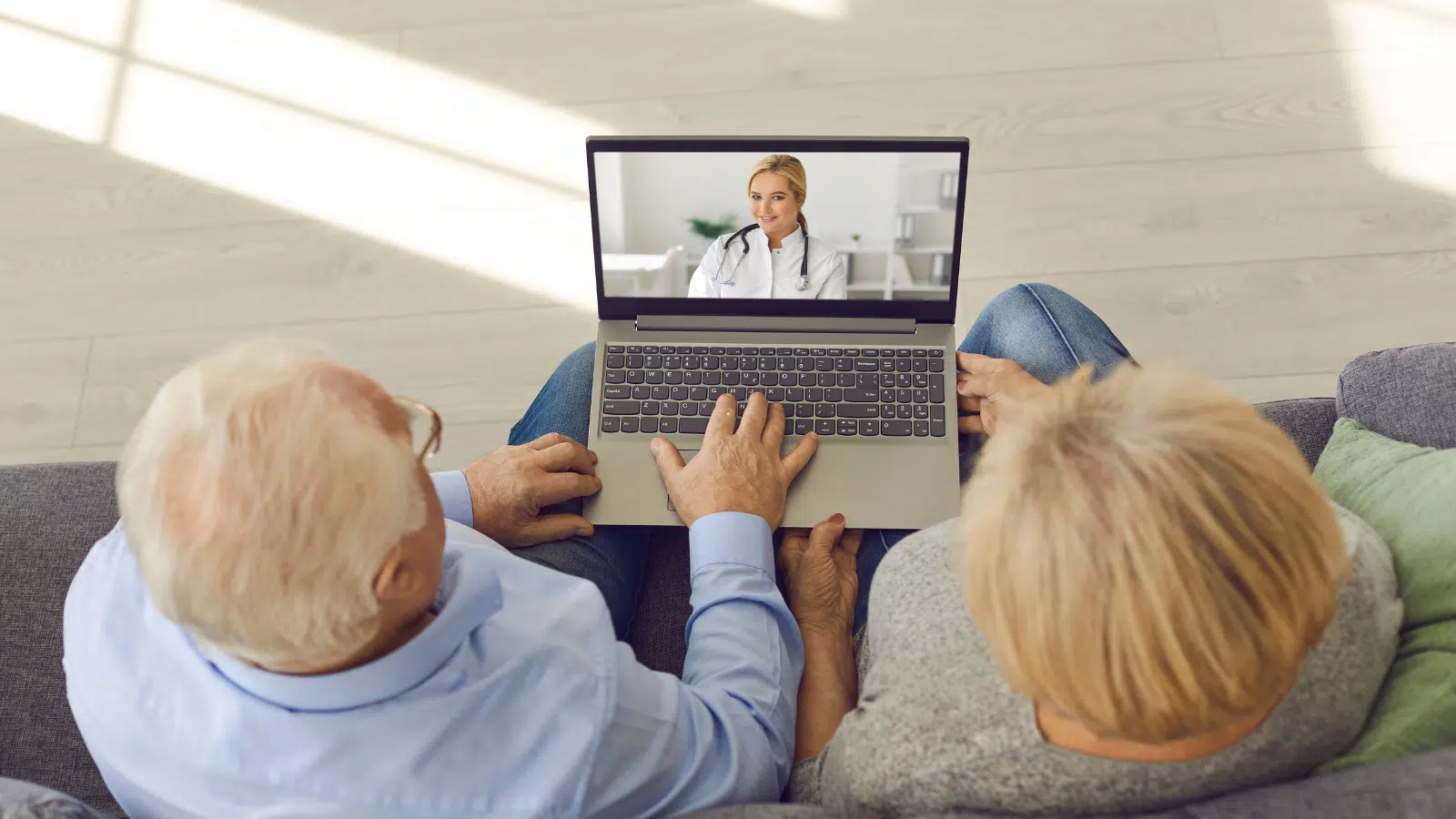 How Does Telehealth Help Older Primary Care Patients? Feature Image: Older couple in a teleheatlh session