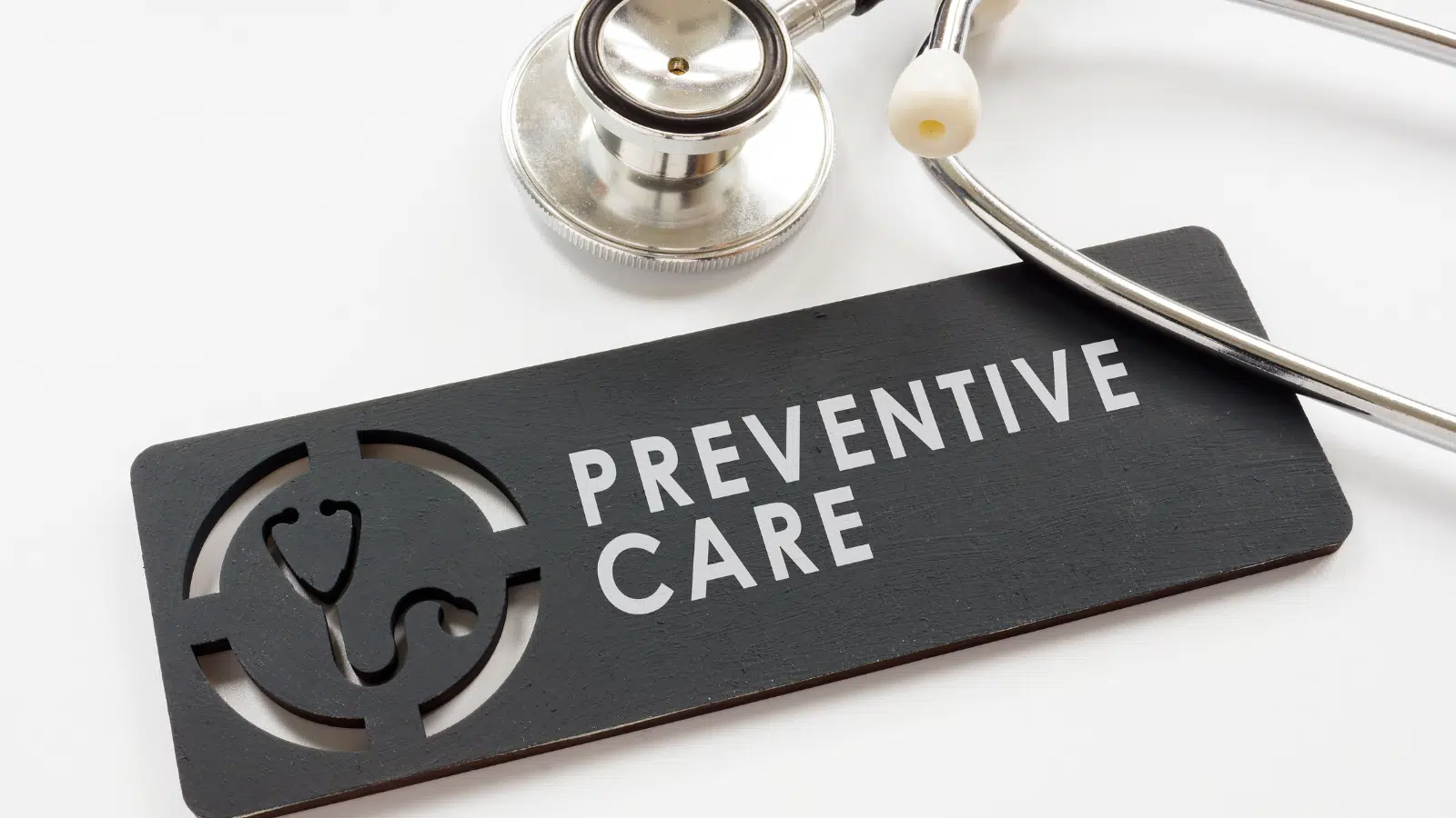 How Can Preventive Care Improve Health After 60? Feature Image: A sign that says Preventative Care next to a stethoscope