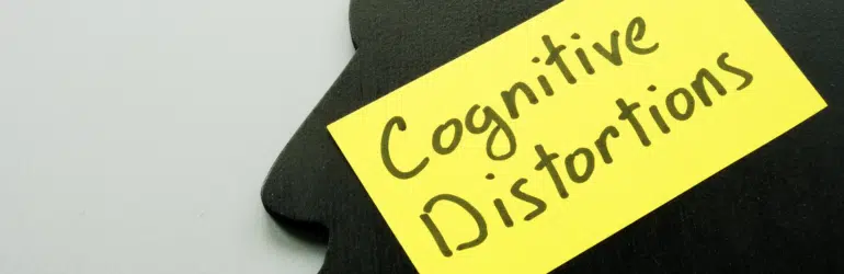Cognitive Distortions sign on the head shape as symbol of mind.