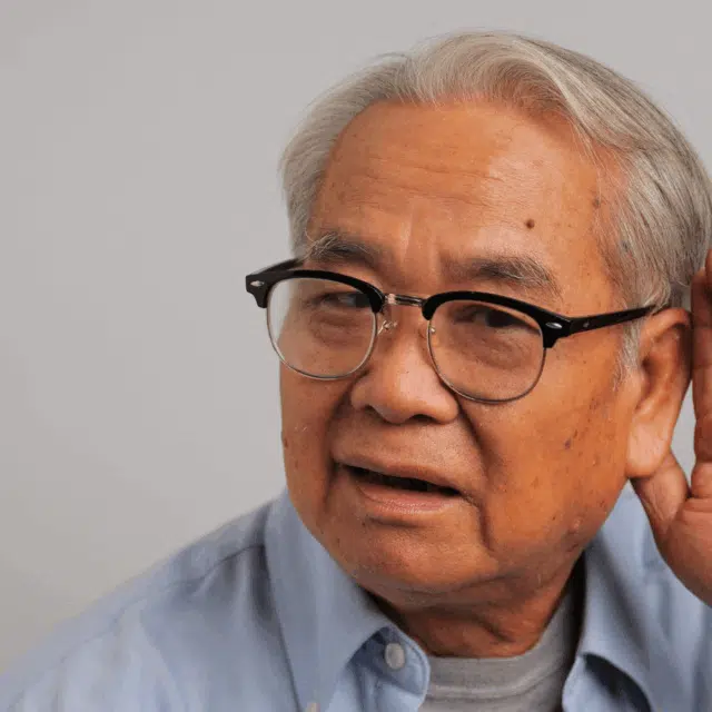 The 5 Main Causes of Vision and Hearing Loss in Older Adults Feature Image: Asian old man couldn't hear the cause of his deafness