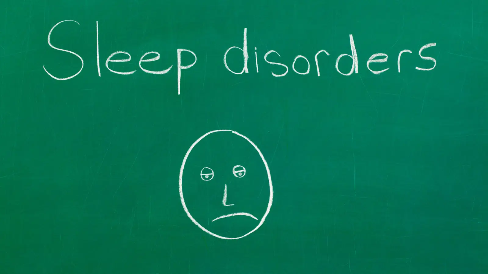 What Are Sleep Disorders? Feature Image: Chalkboard with "sleep disorders" and face drawing