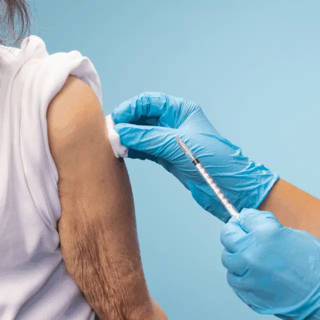 What Vaccines Should Adults 60+ Get This Fall? Feature Image: Woman about to get a vaccine shot